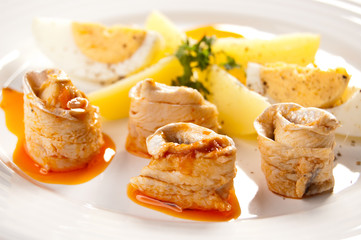 Marinated herring fillets, eggs and potatoes