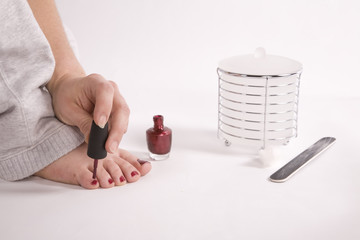 Woman painting nails