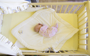 Fototapeta na wymiar baby in cot