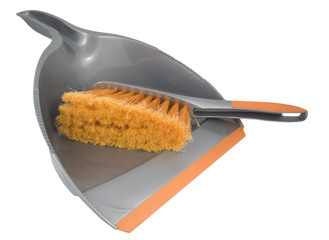 silver and orange dust pan and brush on white