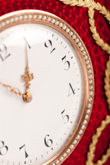 Fototapeta na wymiar Close-up of red and gold antique tambour clock