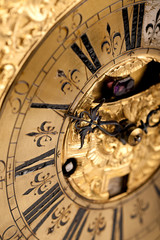 Fototapeta na wymiar Close-up of historic gold and black clock