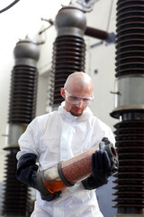 plant worker in rubber,protective gloves