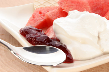 melon with cream fresh and almond slivers and wafer