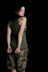 Fototapeta na wymiar Military girl in Handcuffs