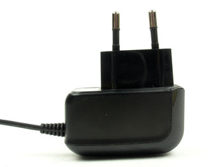 The black charger for a mobile phone