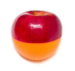 Aplle standing on orange