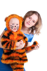 elegant woman and the girl in a suit of a tiger