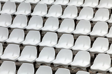 Empty white chairs