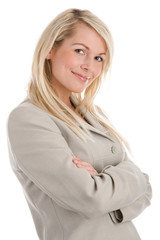 Blond businesswoman with arms crossed