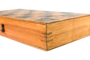Old closed wooden chessboard (isolated on white)
