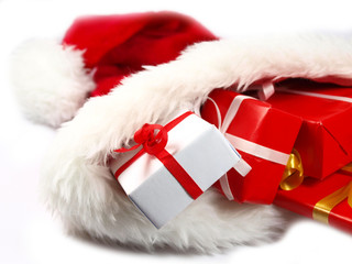 Santa&acute;s hat with Christmas gifts