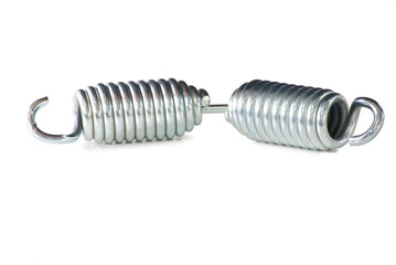 Two steel shiny springs. Isolated on white background.