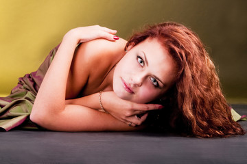 Young girl in dress on floor