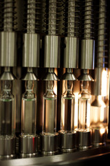 glass vials in pharmaceutical company close up