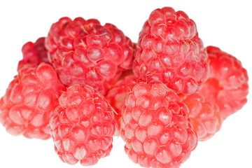 isolated juicy ripe raspberries