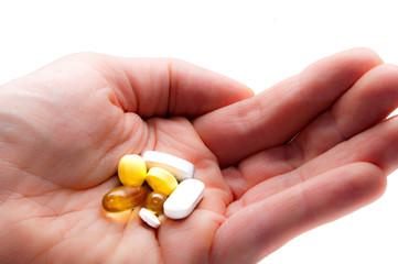 Hand full of vitamins