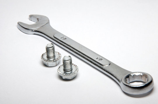 Chrome combination wrench and screws