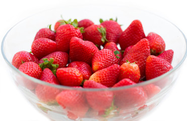 Bowl of strawberries on white