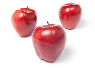 Three red juicy apples, isolated on white