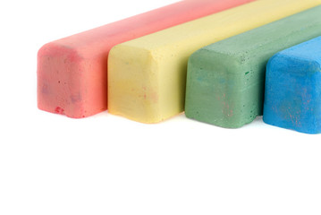 Colorful chalks on white background