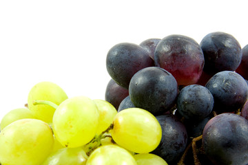 Blue and white grapes over white