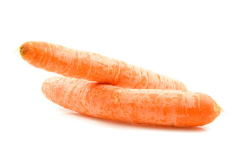 Two fresh orange carrot over white background