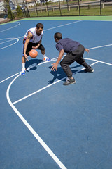 Men Playing Basketball