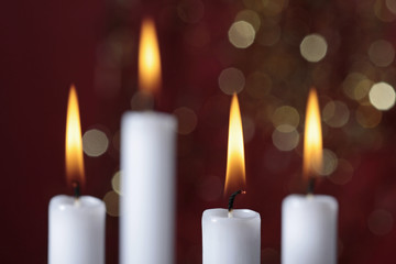 four burning candles