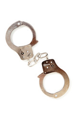 Silver handcuffs on a white background