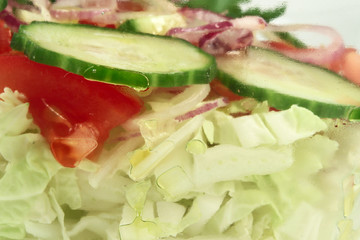 Fresh salad in glass container