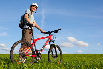 Naklejka premium Men with mountain bike.