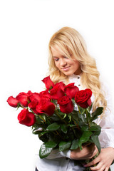 young blonde girl with a bouquet of flowers