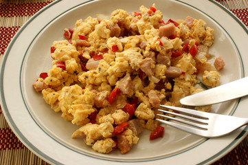 scrambled eggs with organic tomato and bacon