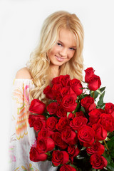 young blonde girl with a bouquet of flowers
