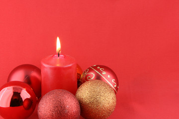 chrismas still life with red candles and balloons