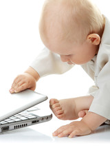Fototapeta na wymiar Baby with laptop