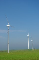 three wind turbines