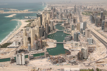 Fototapeta premium Waterfront Construction And Properties In Dubai