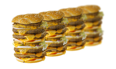A row of mega cheeseburgers isolated on white background