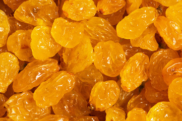 Background made of yellow dried raisins
