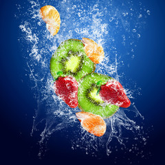 Drops around fruits under water