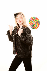 Fototapeta premium Pretty young woman with lollipop