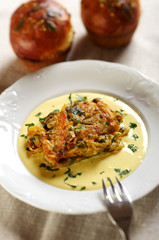 Fried pumpkin slices with creamy sauce