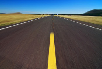 motion of empty highway road along the grand canyon