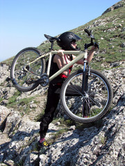 Young woman with mountain bicycle