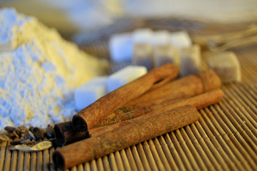 closeup with cinnamon, flour and sugar