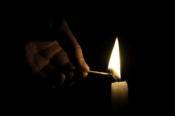 Man is firing a candle