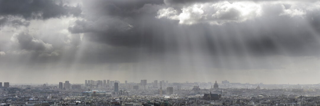 paris overview with tunderstorm caming
