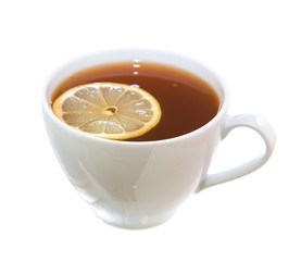 white cup of tea with lemon, isolated on white